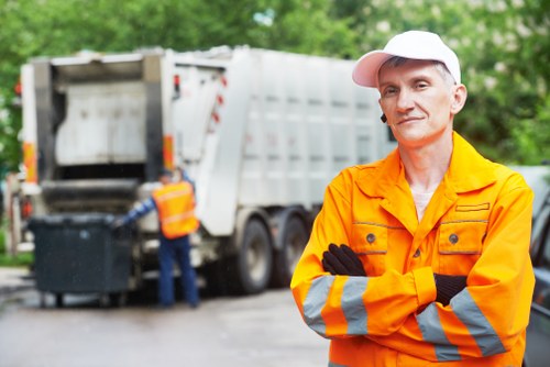 Professional collecting garden waste in Hayes