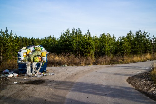 Workers sorting construction debris for recycling