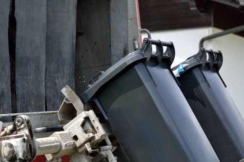 Professional team handling demolition waste in Hayes